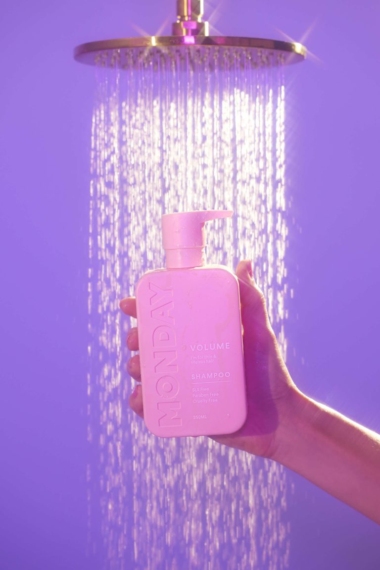 shampoo bottle under shower